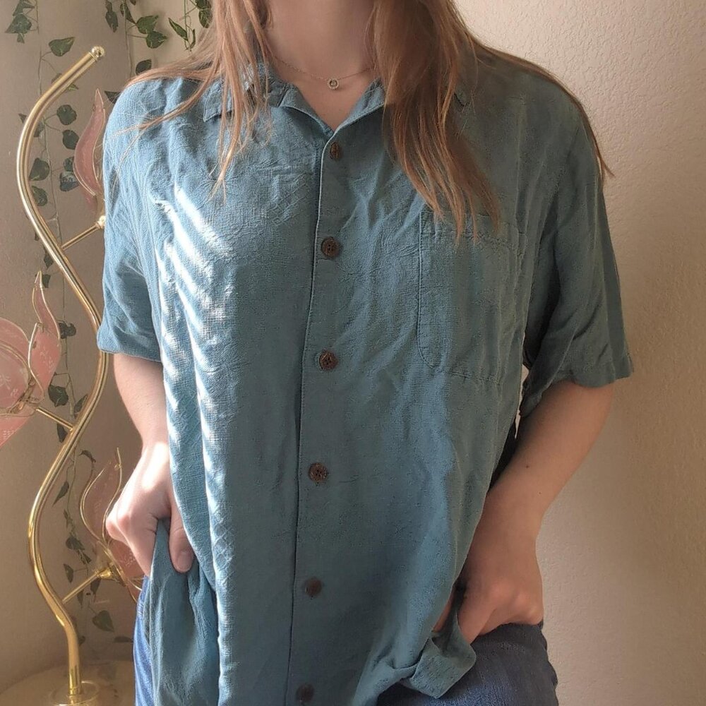 Blue button-up shirt by Caribbean Joe